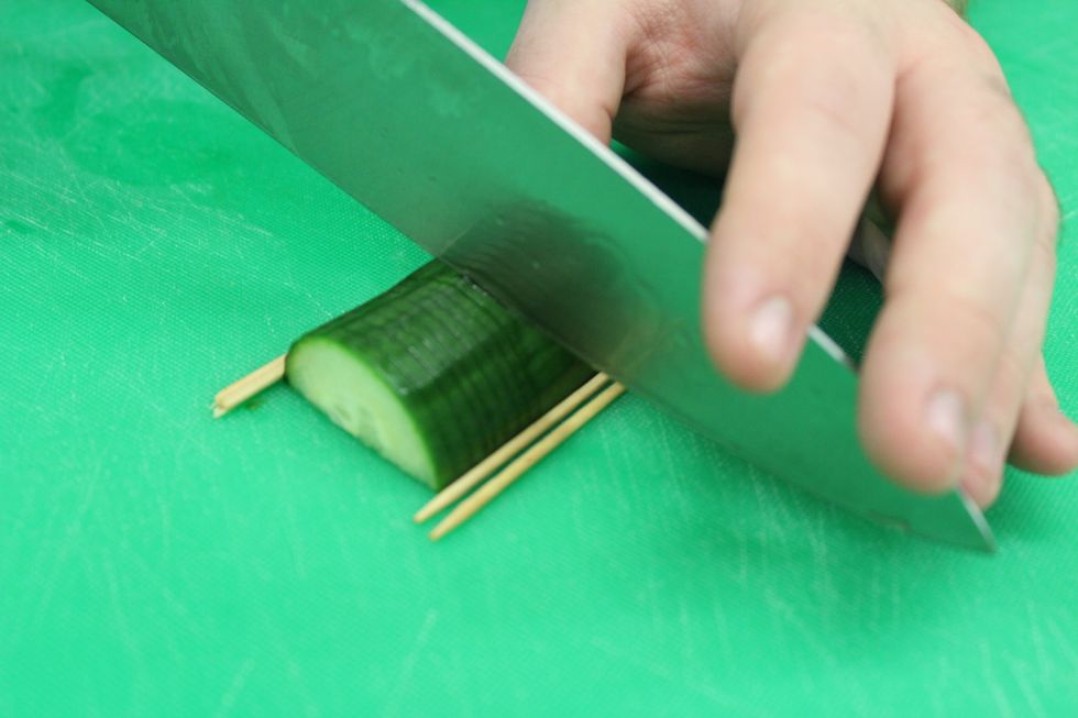 You will then want to make 1/8 inch cuts along the entire cucumber