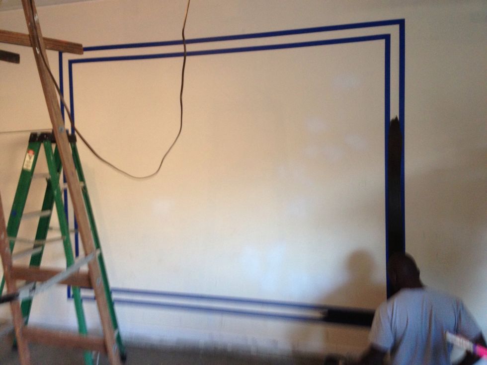 You will want to tape wall with a straight line at those marks using a level. Green masking tape is the best and can be picked up at your local Home Depot or lowes . I used 2" tape