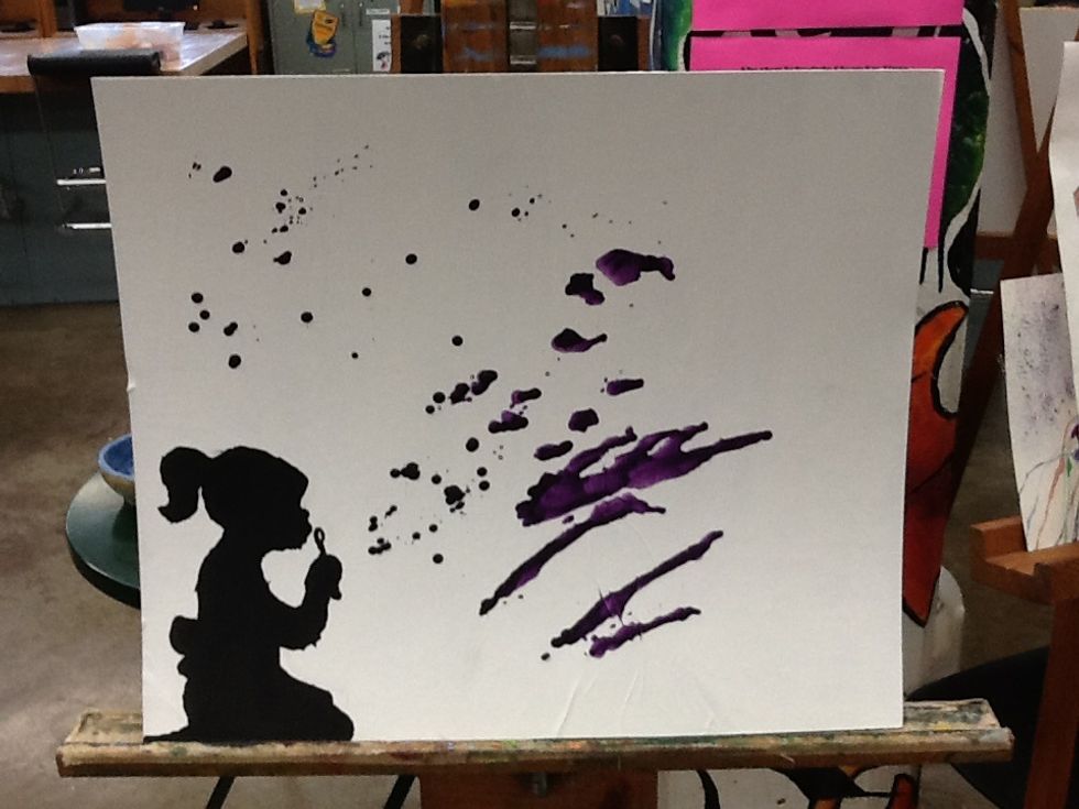 You would then choose a color of crayon you want to do first. Then you would peel the paper off the crayon, Then you would hold the crayon in the pliers and melt it with the crayon melt then repeat.