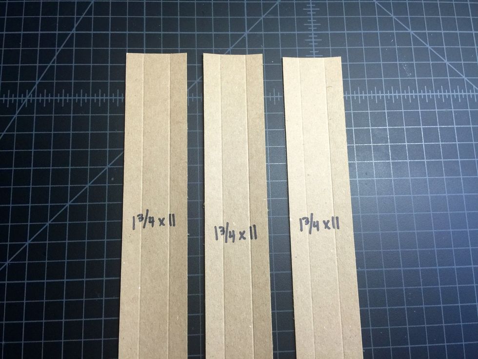 Your 3 hinges will look like this. We'll be adding ScorTape to the left and right of the 2 score lines on each hinge.