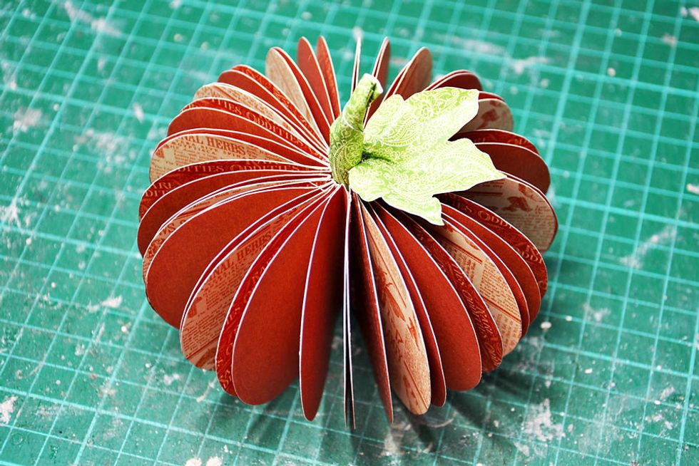 Your basic pumpkin is finished. Now it is good for decorating any way you like. I have chosen to highly embellish mine using Graphic 45 Rare Oddities Collection.