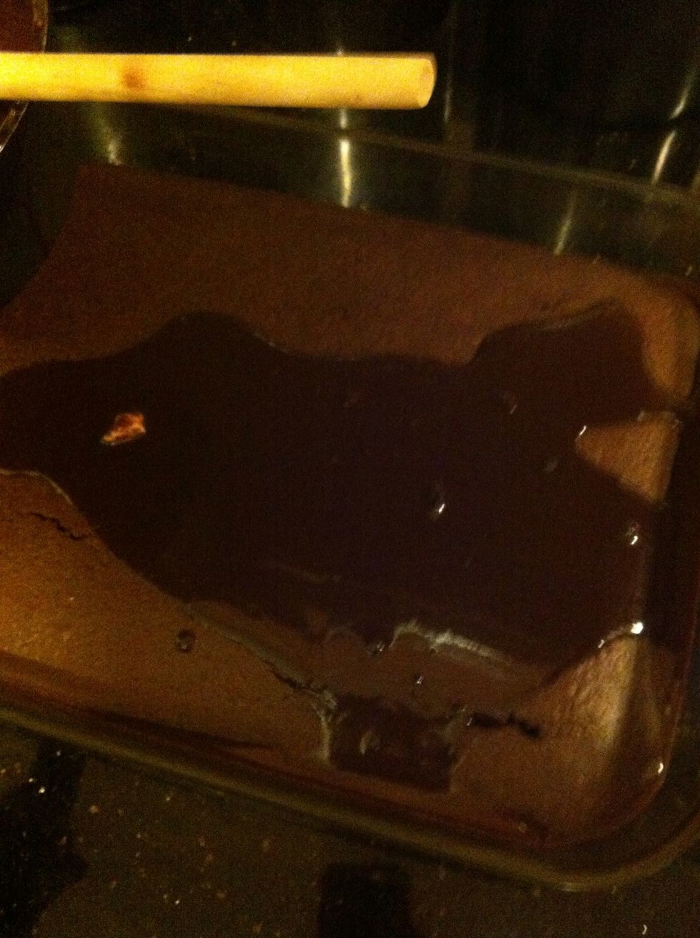 Your cake should be done. While your cake is still warm, pour your sauce over your cake.