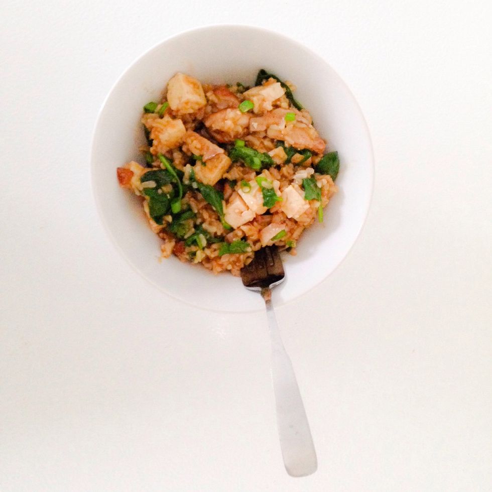 Your dish is complete! Add sliced scallions on top for a finishing touch.