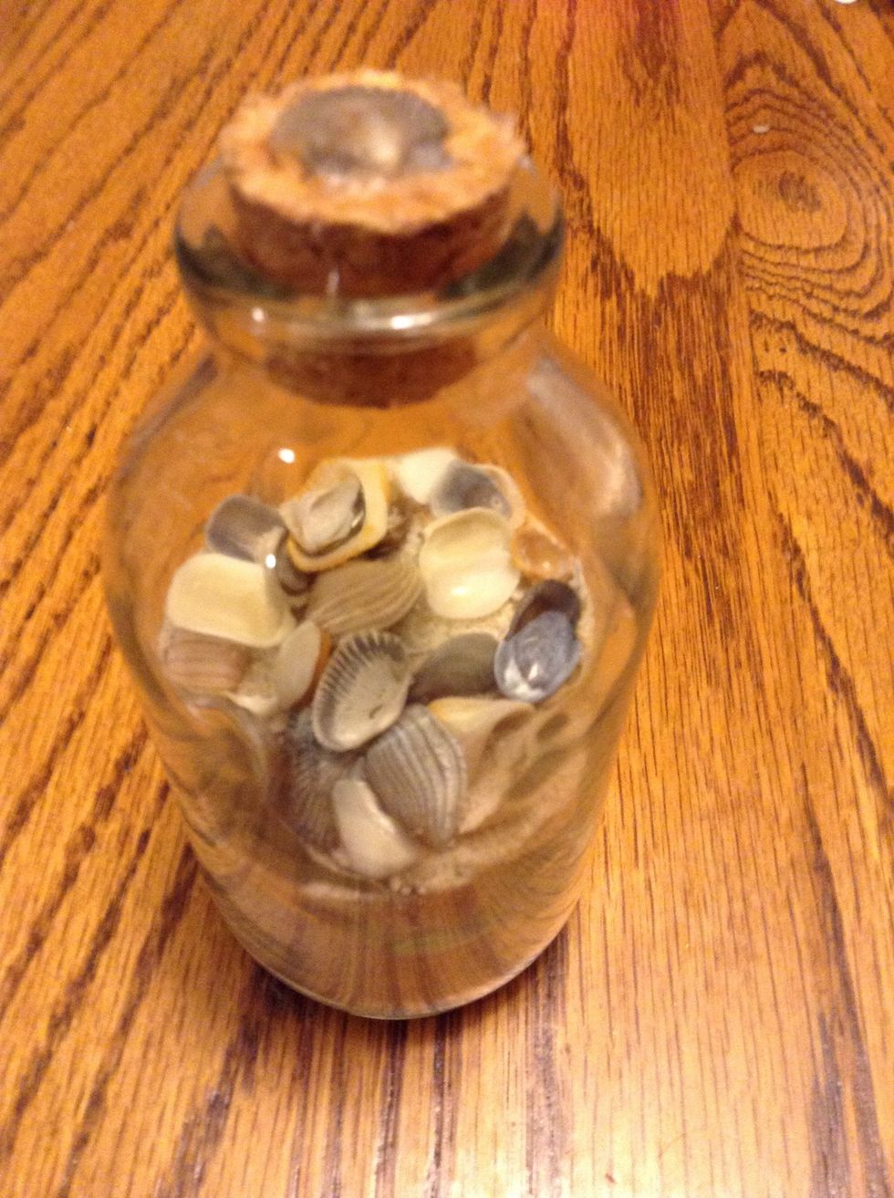 your done! I chose to leave mine alone, but you could color the sand or paint the shells...just be creative!