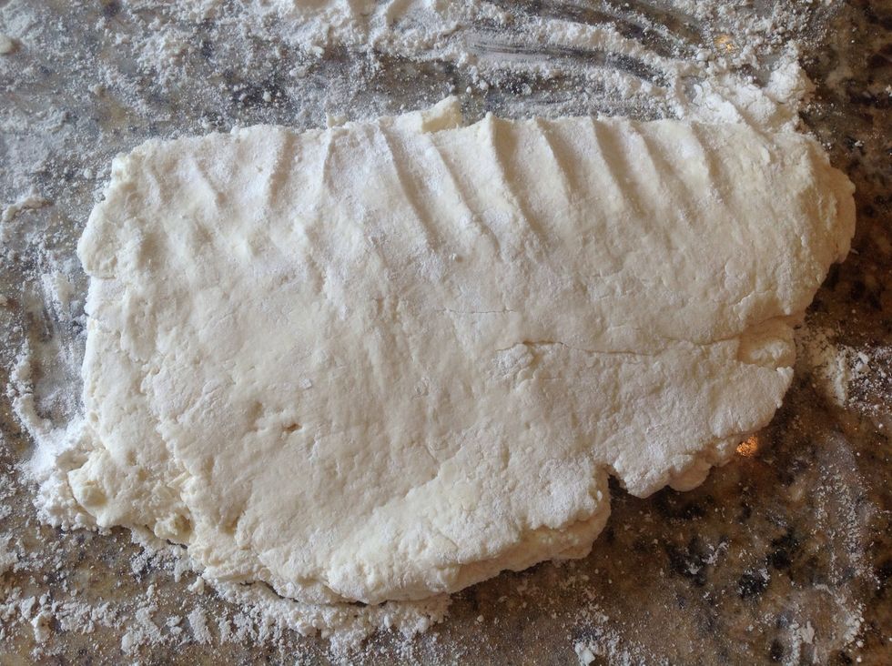 Your dough should be about 1/2 inch thick. Don't you dare go get a ruler. These are your biscuits and they are going to be awesome. Grab your pan and bring it nearby.