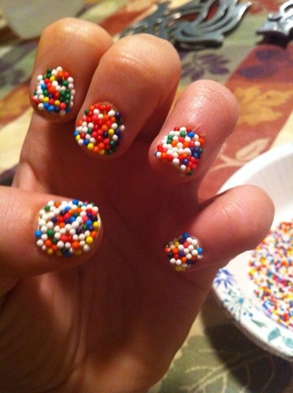 Your eyes aren't playing tricks on you- these are real sprinkles! You can easily achieve this awesome mani that'll shock everyone when you say you did it yourself! Stop drooling and let's get started!