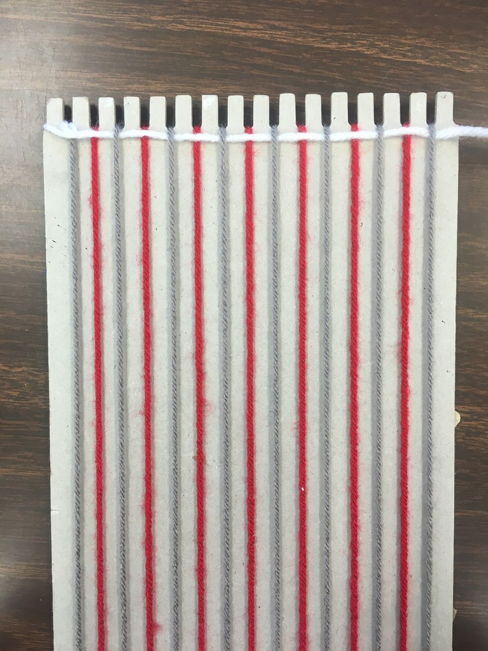 Your first row when completed and the thread pulled completely through should look like this.