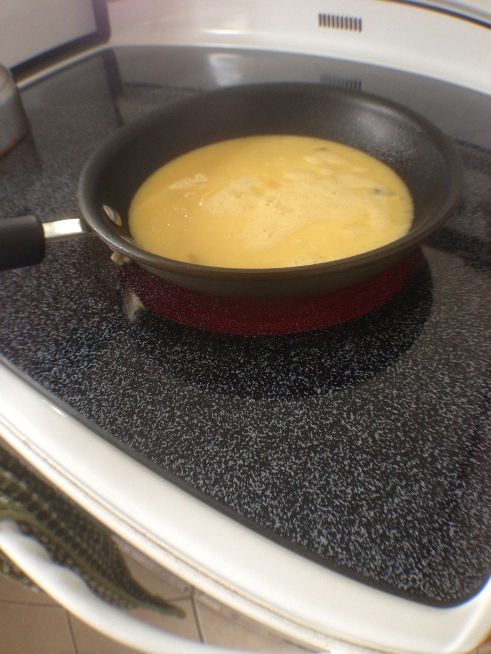 Your going to wait about 3 minutes and you'll see that the eggs start to solidify.