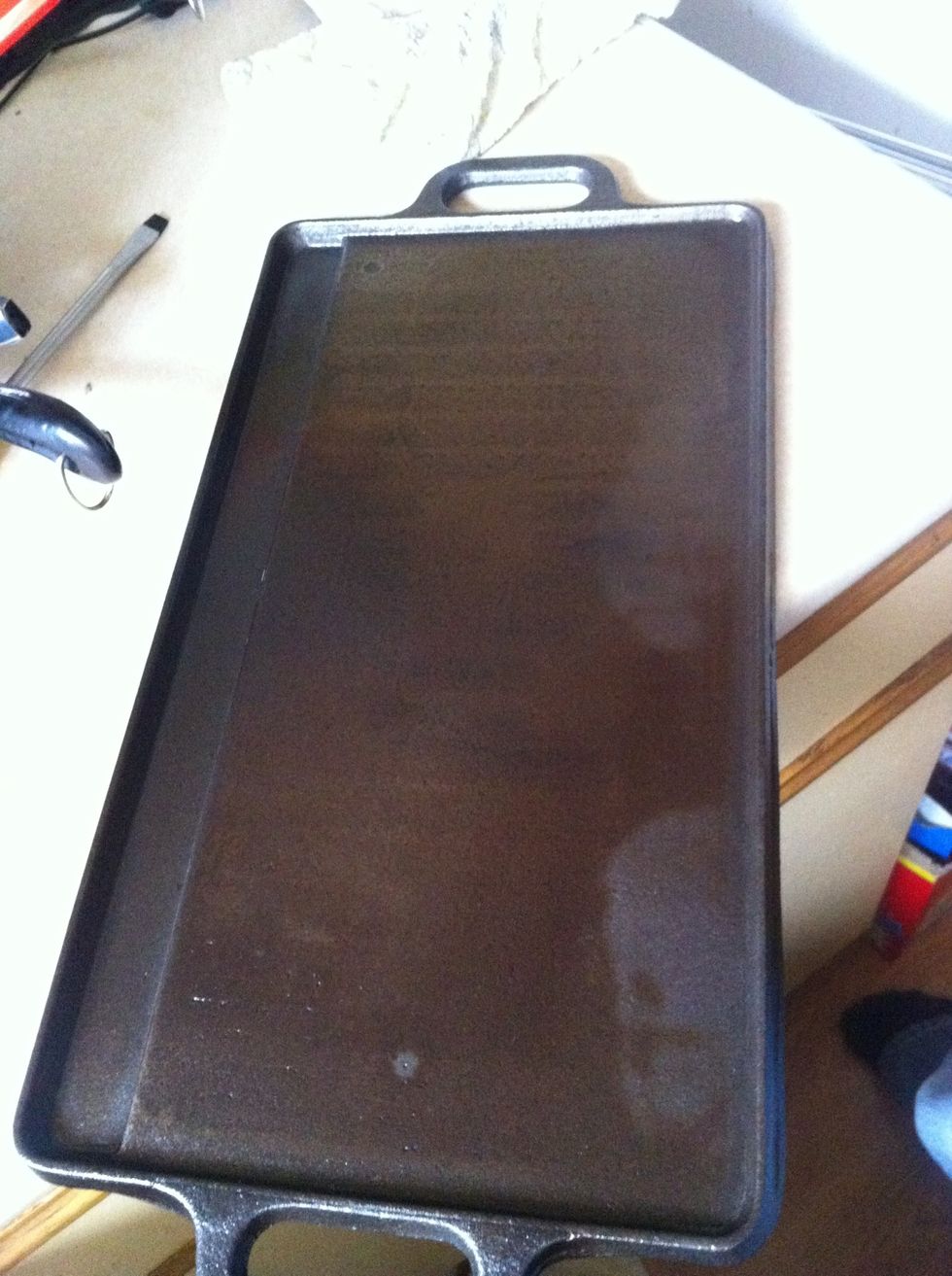 Your pan will have darkened brown or black instead of grey. Repeat steps 5 - 7 several times until your pan turns to a nice black colour.