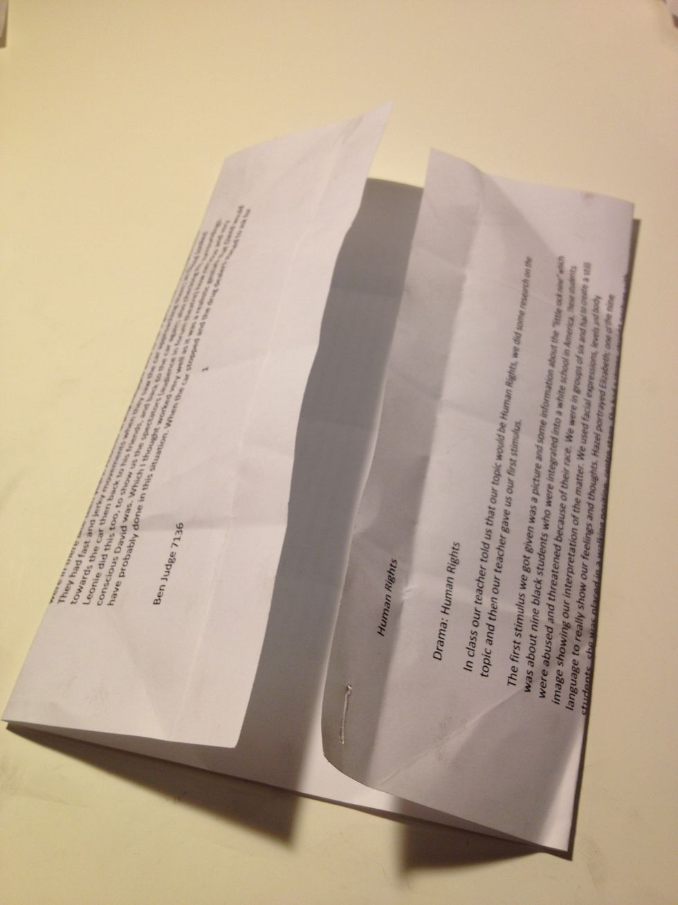 Your paper should now look like this when all sides are folded in, turn the page landscape ready for next step