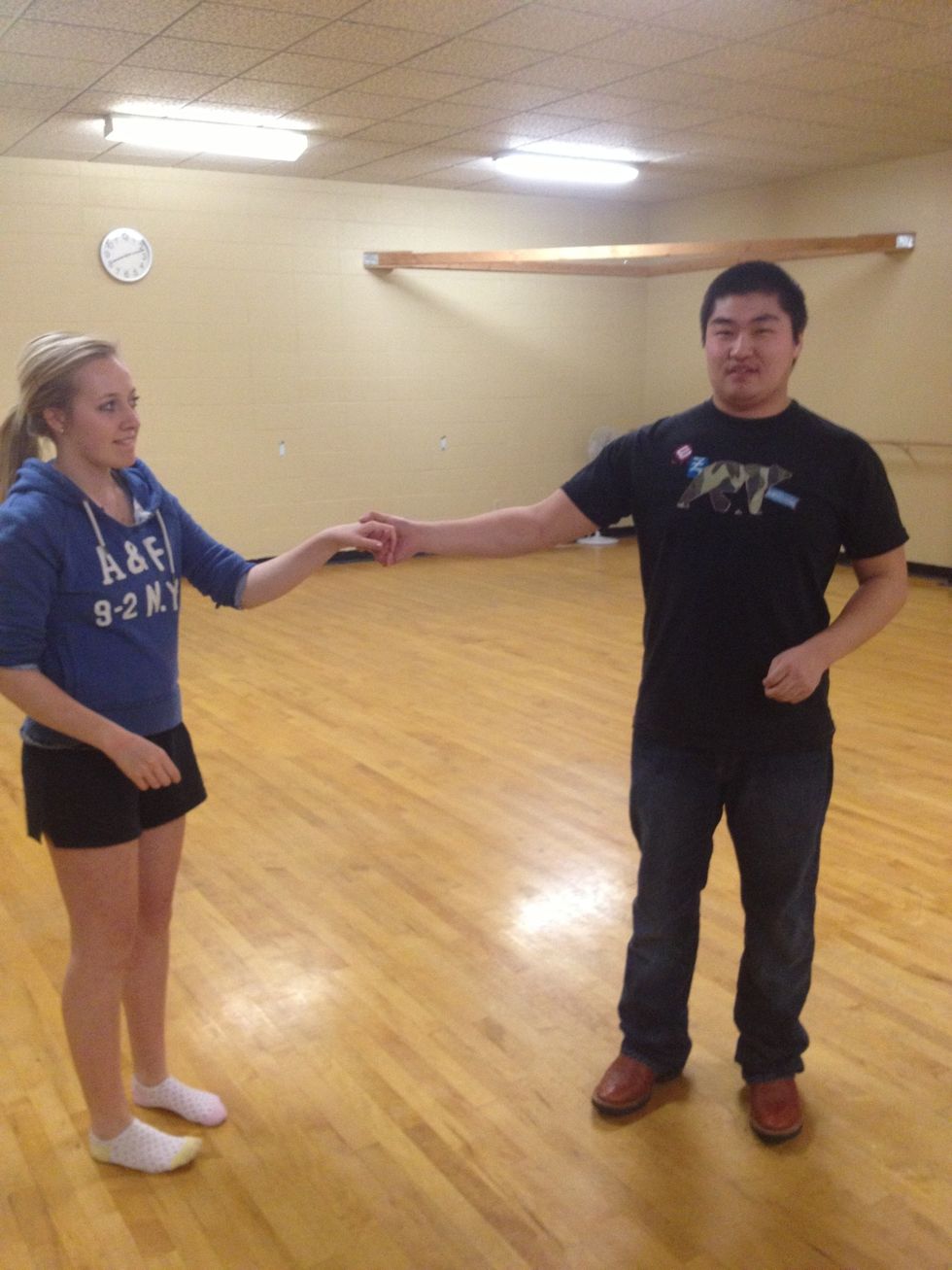 Your partner is going to run and jump. You are going to catch her in the cradle.