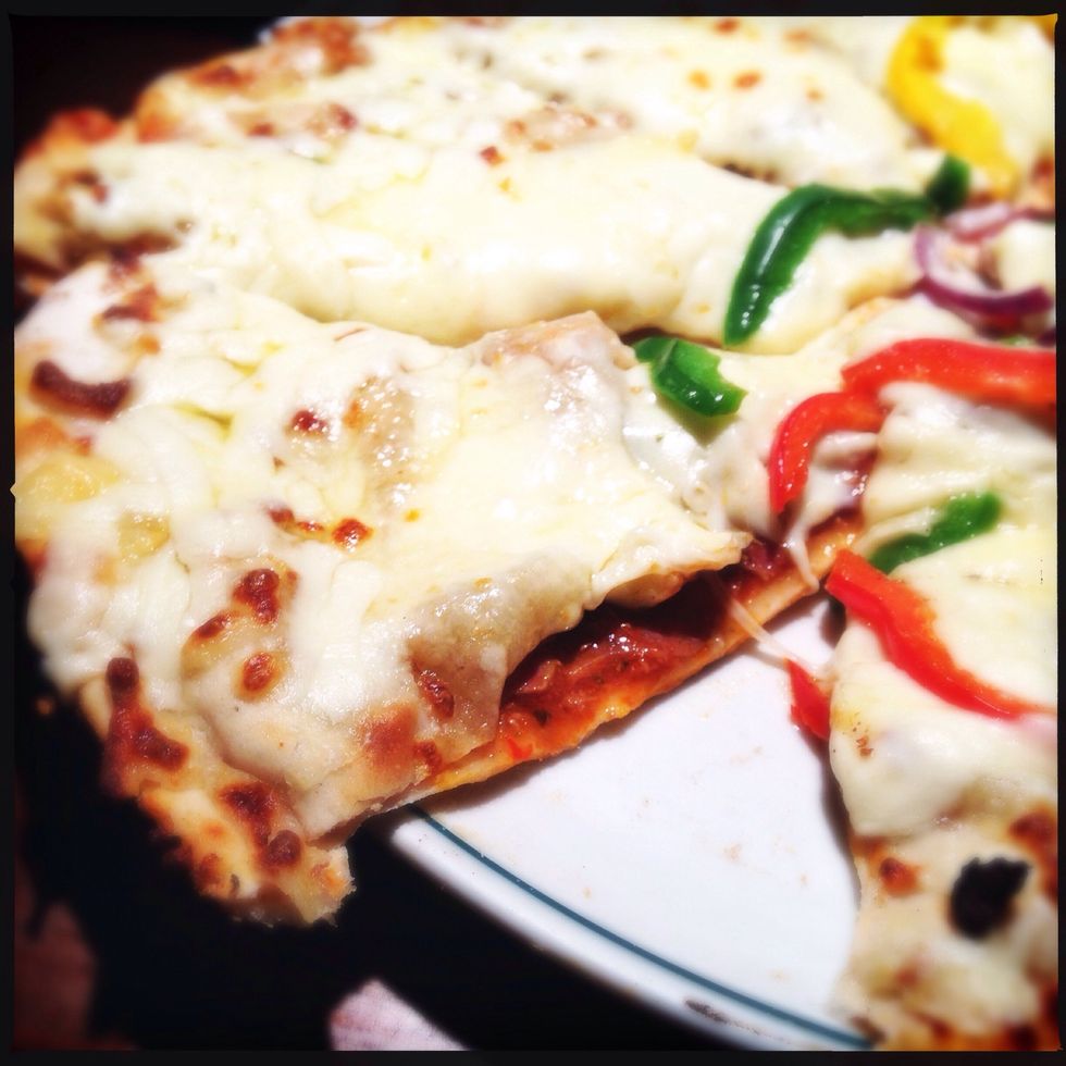 Your pizza will be stuffed with spicy meat (like the Caribbean heat!)