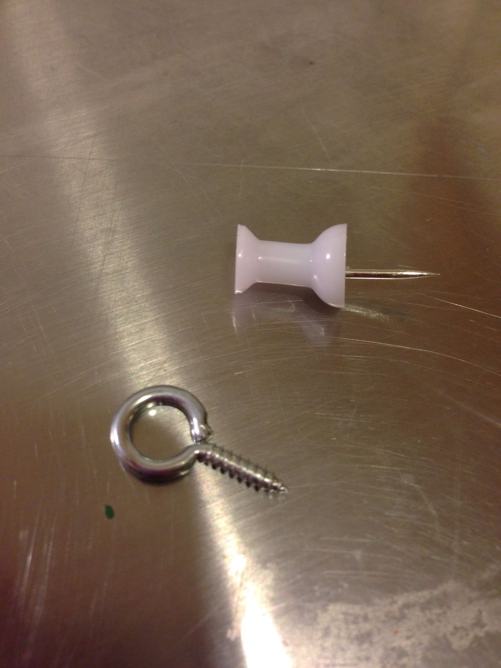 Your push pin---found in the junk drawer $free and eye screw---Walmart 14 ct. $.97