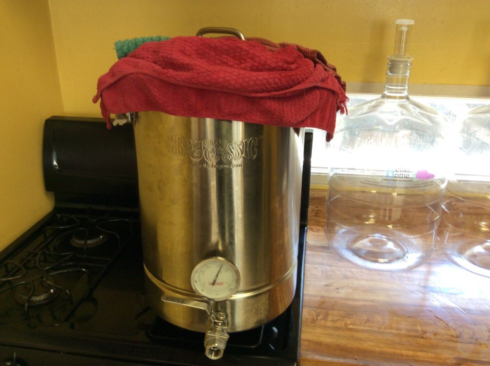 Your recipe will have a steeping time. Mine was 45 minutes. The towels are to help prevent heat loss. If the temperature gets more than s few degrees off the target temperature, a few burns get it up.