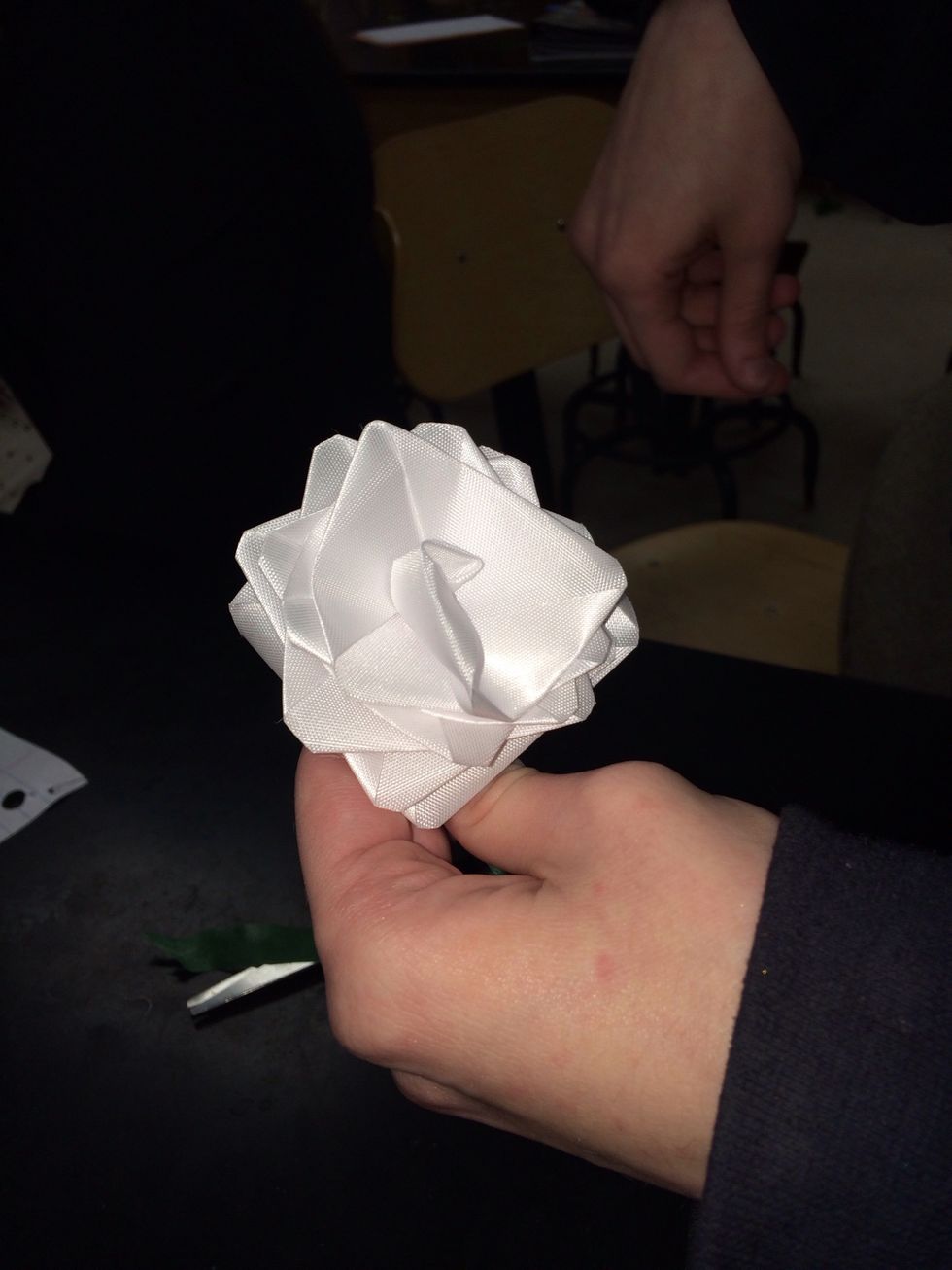 Your rose should look like this, then floral tape it to a pen