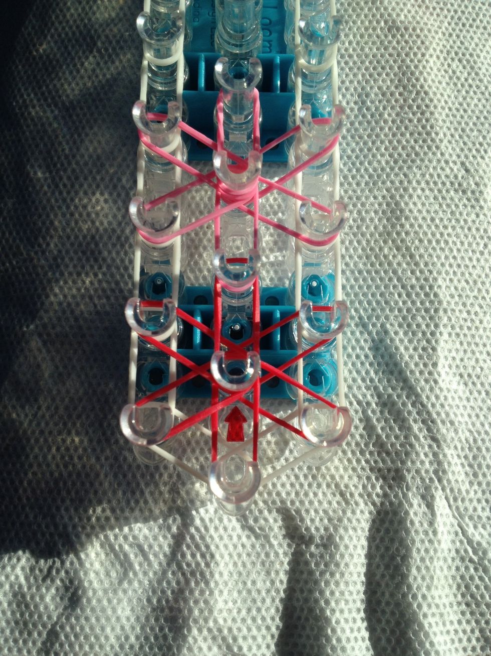 Your second finished starburst! Continue the process until you have reached the top of the loom.