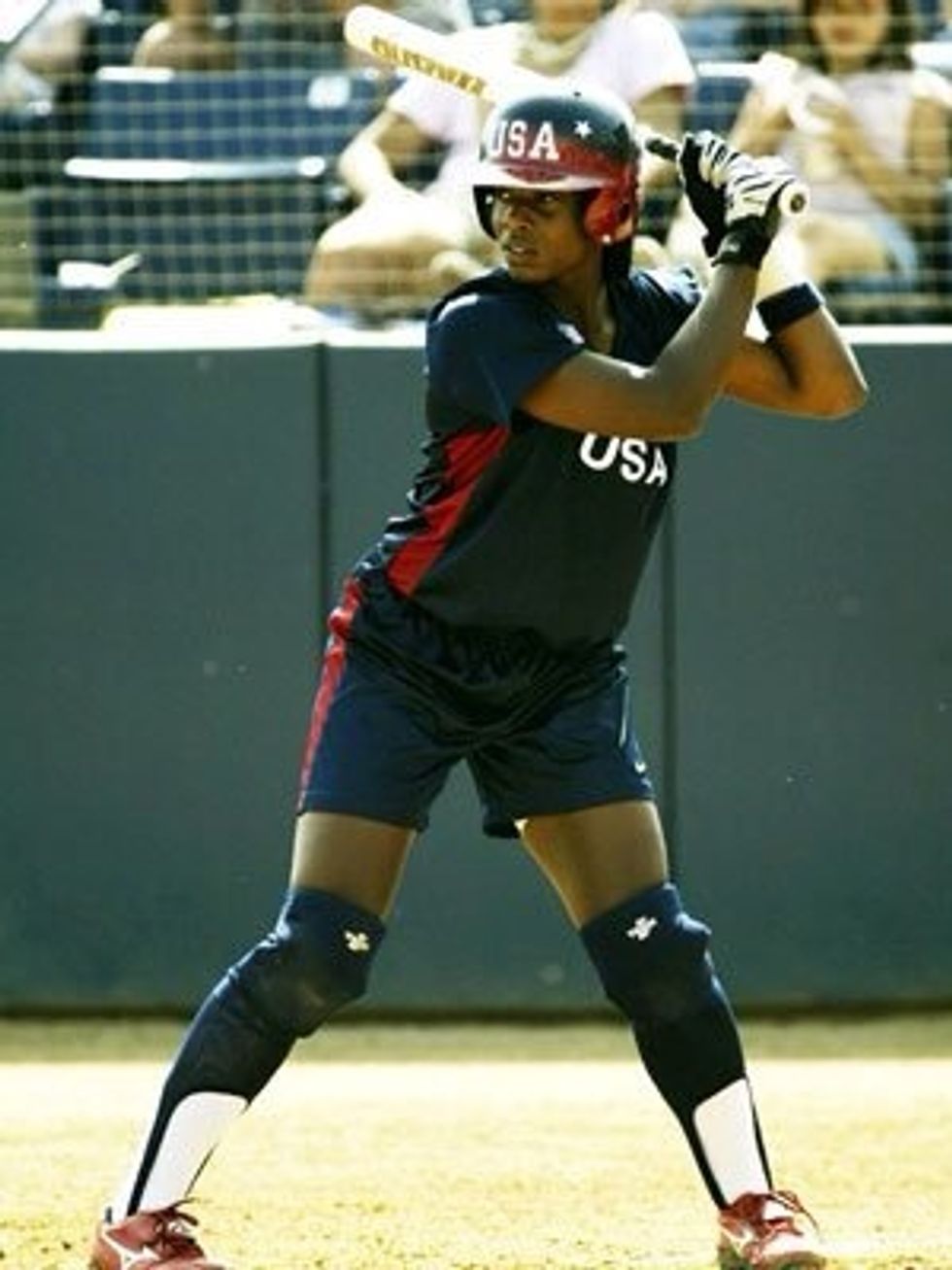 Your stance should be strong, and should feel balanced. Feet should be set apart and knees should be bent slightly. Your elbow should be brought back so your hands on the bat are at head level.