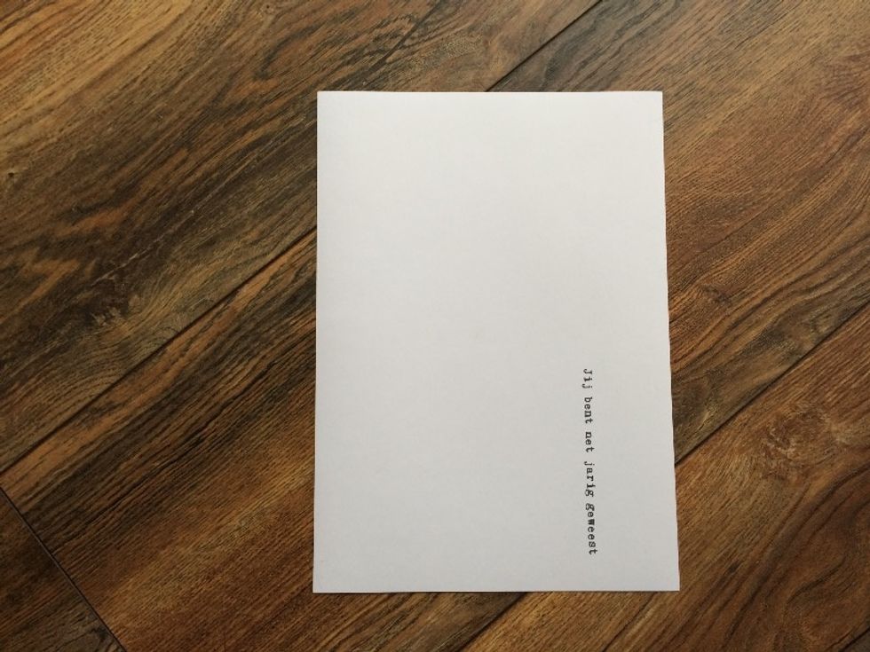... your text needs to be centered between the bottom edge and the center of your paper. Do some try out prints first to figure out the most satisfying text placement.