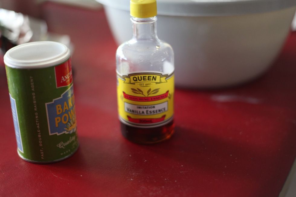 Your trusty vanilla essence. You can use vanilla powder also.