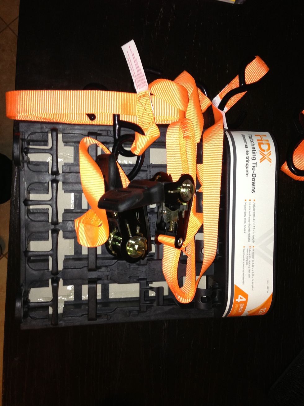 Your typical ratcheting tie downs. These are from Home Depot, I bought them for $13.97 for four. The strap clamp that they sell comes in a one pack and costs 12.97.