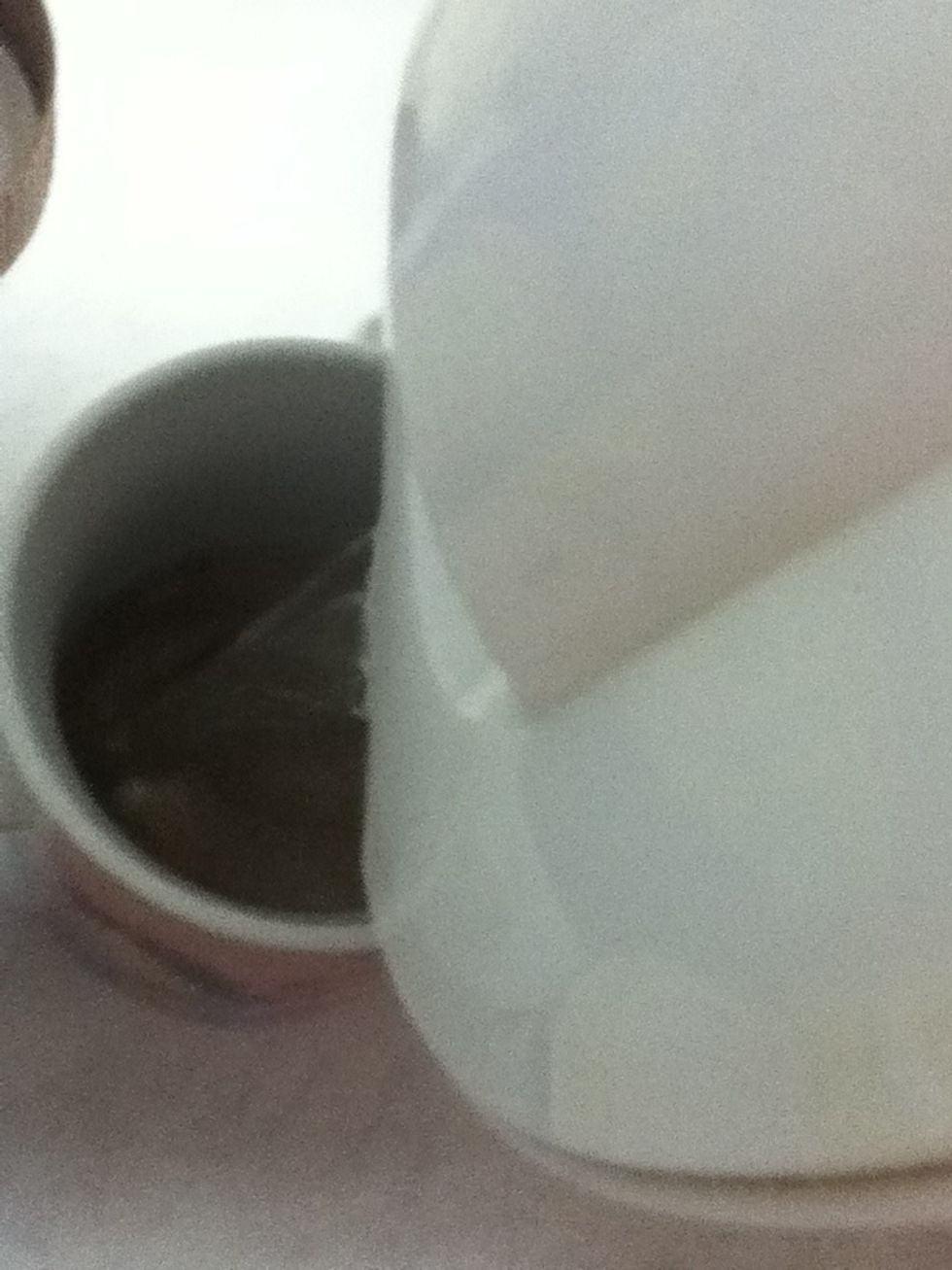Your water should be boiled by now; so pour it in!