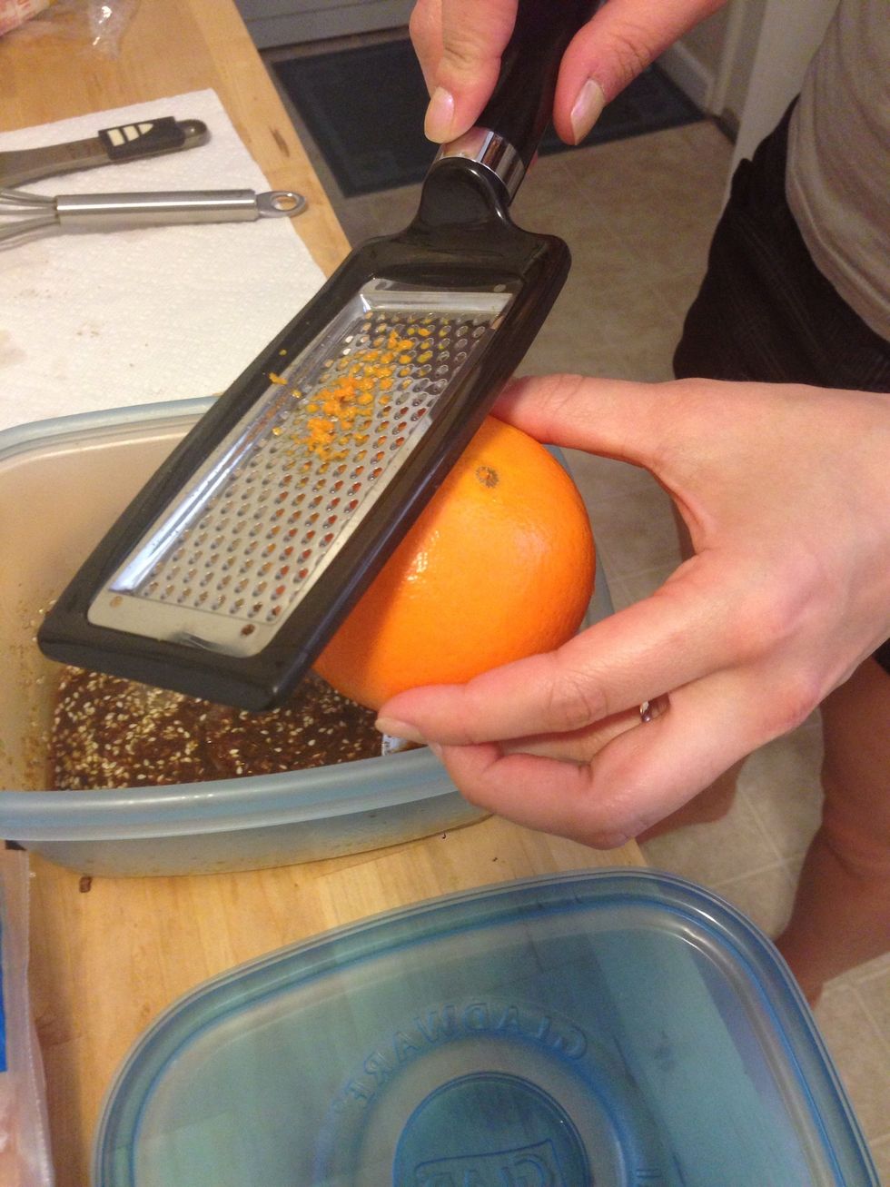 Zest a little less than half an orange and add it to the mixture.