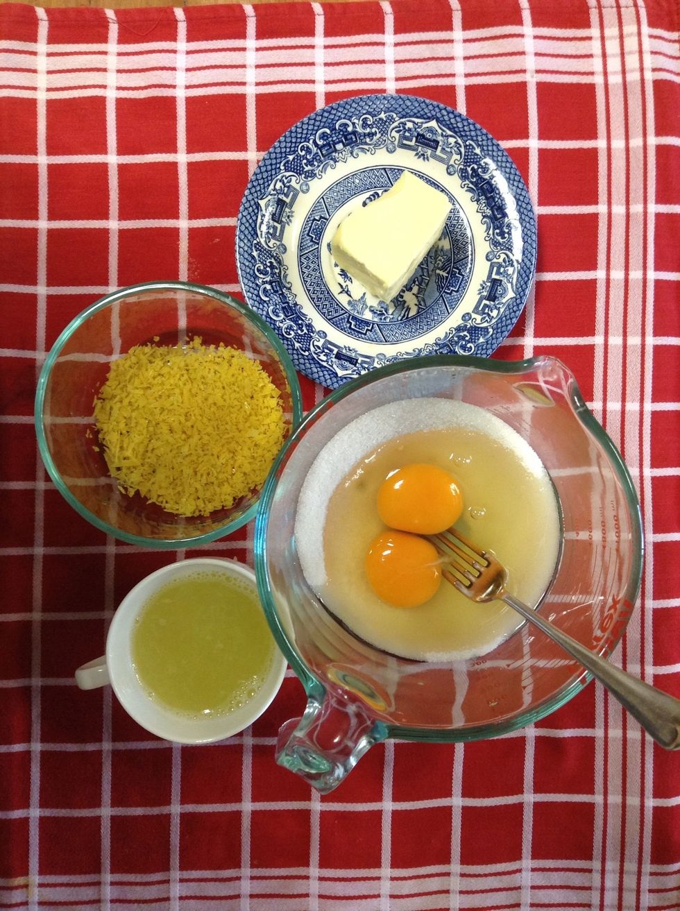 Zest and juice lemons. Add eggs to sugar and mix well, you could mix these straight in your small saucepan to save washing up!