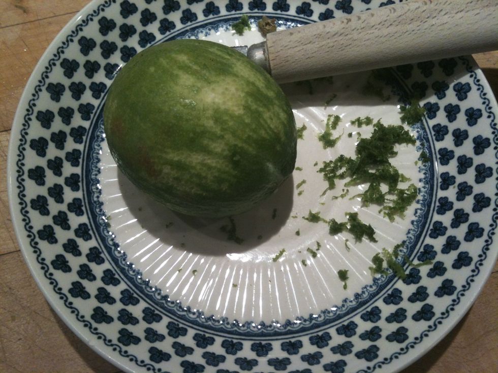 Zest lime, and squeeze juice into a separate cup to be used next.