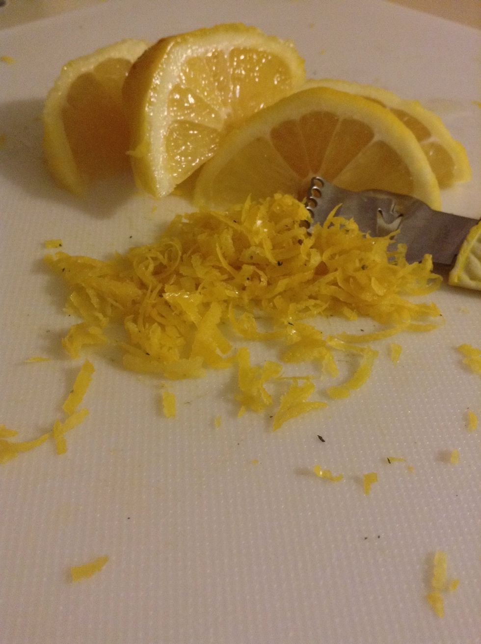 Zest one of your lemons and then roll your lemon (this helps get as much juice out of it as possibly) then simply cut your lemon in half and juice it.